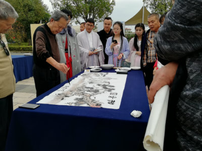 1573923815265241.jpg 万军给画题字.jpg