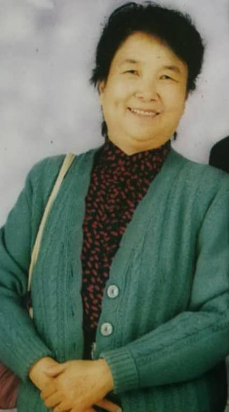 1589096193133542.jpg 母亲单人照.jpg